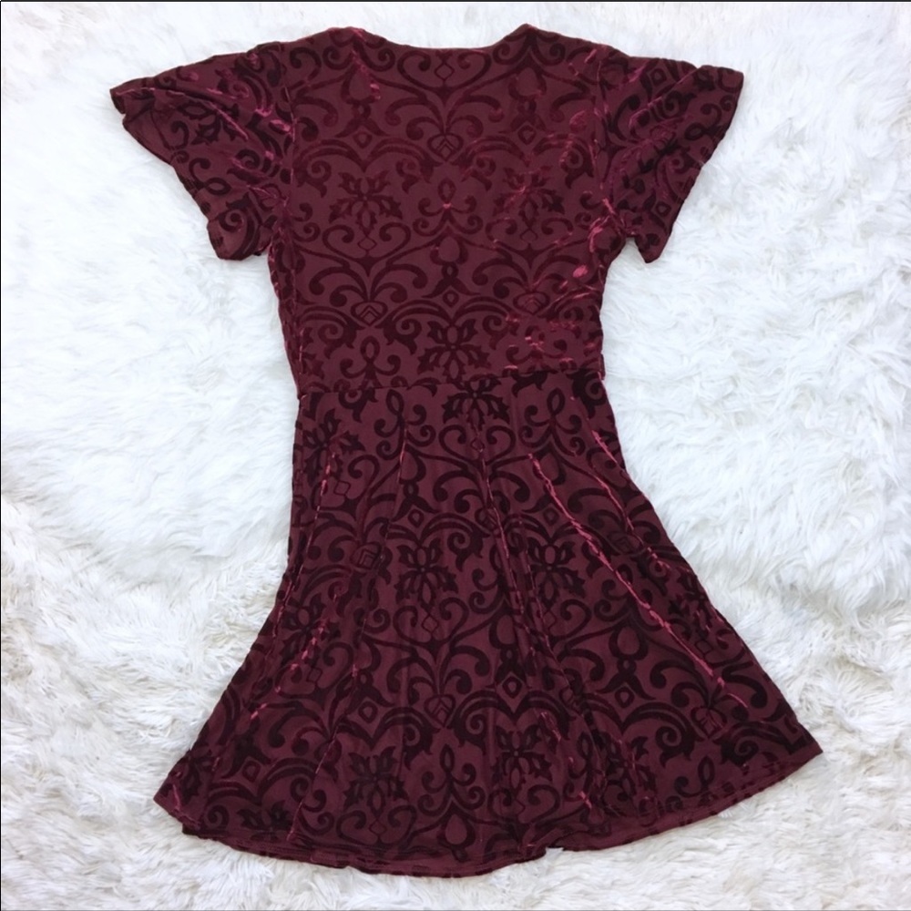 Francesca’s Flutter Sleeve Wrap Dress - Picture 3 of 3